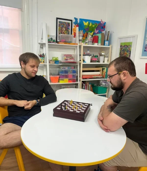 Two friends playing chess